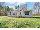Attractive single-story home boasts neutral siding, manicured front lawn, and welcoming facade at 260 Charlie Stacks Rd, Lancaster, SC 29720