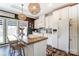 Well-lit kitchen featuring an island with seating and modern appliances at 260 Charlie Stacks Rd, Lancaster, SC 29720