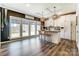 Bright kitchen featuring an island with seating, modern pendant lights, and backyard views at 260 Charlie Stacks Rd, Lancaster, SC 29720