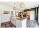 Modern kitchen with an island, pantry, butcher block countertop, and neutral accents at 260 Charlie Stacks Rd, Lancaster, SC 29720