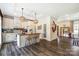 Stylish kitchen with an island, pendant lighting, and an open flow to the living area at 260 Charlie Stacks Rd, Lancaster, SC 29720
