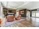 Comfortable living room with two recliners, a fireplace, and dark accent wall at 260 Charlie Stacks Rd, Lancaster, SC 29720