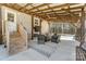 Outdoor patio area with comfortable seating, ceiling fan, and outdoor television at 260 Charlie Stacks Rd, Lancaster, SC 29720