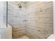 Walk-in shower features modern tile, glass doors, and a built-in shower caddy for toiletries at 260 Charlie Stacks Rd, Lancaster, SC 29720