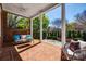 Relaxing outdoor seating with a ceiling fan for maximum comfort at 2622 Sheffield Crescent Ct, Charlotte, NC 28226