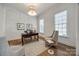 Bright home office with natural light, hardwood floors, and classic furnishings at 2622 Sheffield Crescent Ct, Charlotte, NC 28226