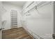 Walk-in closet space with customizable shelving and plenty of storage space at 2622 Sheffield Crescent Ct, Charlotte, NC 28226