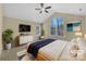 Bedroom with a large window, ceiling fan, and ample natural light at 2905 Polo View Ln, Matthews, NC 28105