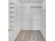 Spacious walk-in closet with multiple shelves, providing ample storage space at 2905 Polo View Ln, Matthews, NC 28105