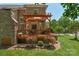 Brick home with a spacious wooden deck and pergola, perfect for outdoor living at 3017 Chisholm Ct, Waxhaw, NC 28173