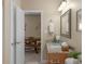 Bathroom featuring a granite countertop vanity, a mirror, and an open doorway leading to another room at 3017 Chisholm Ct, Waxhaw, NC 28173