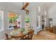 Cozy breakfast area with views of the outdoor patio and fireplace at 3017 Chisholm Ct, Waxhaw, NC 28173