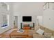 Bright and inviting living room with high ceilings and large windows at 3017 Chisholm Ct, Waxhaw, NC 28173