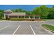 Community pool with arbor, parking, and manicured hedges at 3017 Chisholm Ct, Waxhaw, NC 28173