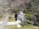 Aerial view of the property showcasing the home's layout and surrounding landscape at 306 7Th Street Ne Pl, Conover, NC 28613