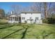 Expansive backyard featuring the home's exterior with screened in porch at 306 7Th Street Ne Pl, Conover, NC 28613