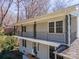 Upper-level balcony showing decorative railings and gray painted brick at 306 7Th Street Ne Pl, Conover, NC 28613