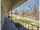 View from the balcony with black railings overlooking the front yard and neighborhood at 306 7Th Street Ne Pl, Conover, NC 28613