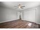Spacious bedroom features hardwood floors, a ceiling fan, and a closet with double doors at 306 7Th Street Ne Pl, Conover, NC 28613