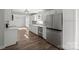 Well-lit kitchen with stainless steel appliances, modern cabinetry, and open layout at 306 7Th Street Ne Pl, Conover, NC 28613