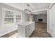 Stylish kitchen island with seating, offering ample counter space and natural light at 306 7Th Street Ne Pl, Conover, NC 28613