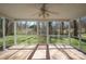Inviting screened porch offering picturesque views of the surrounding landscape with natural light at 306 7Th Street Ne Pl, Conover, NC 28613