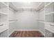 Spacious walk-in closet featuring custom shelving and ample storage for organization at 306 7Th Street Ne Pl, Conover, NC 28613