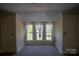Bedroom with three windows between two closets at 312 Gold Hill Ave, Rockwell, NC 28138