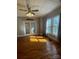 Bright dining room featuring hardwood floors, large windows, and elegant French doors at 312 Gold Hill Ave, Rockwell, NC 28138