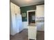 Traditional kitchen with white cabinets, tile floors, and kitchen island at 312 Gold Hill Ave, Rockwell, NC 28138