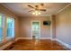 Bright living room featuring hardwood floors, coffered ceiling, and neutral wall color at 312 Gold Hill Ave, Rockwell, NC 28138