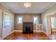 Inviting living room with hardwood floors and a traditional fireplace at 312 Gold Hill Ave, Rockwell, NC 28138