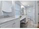 Beautiful bathroom with double vanity, marble countertop, and a clean, refreshing design at 3808 Severn Ave, Charlotte, NC 28210