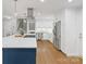 Modern kitchen with white cabinets, stainless steel appliances, and a functional layout at 3808 Severn Ave, Charlotte, NC 28210