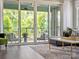 Inviting balcony with comfortable seating, views of the outdoors, and sliding doors from the living room at 403 Old Town Village Rd, Waxhaw, NC 28173