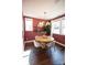 Cozy dining room featuring a round table, modern lighting, and ample natural light at 403 Old Town Village Rd, Waxhaw, NC 28173