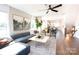 Comfortable living room featuring a stylish sofa, a modern coffee table and an open floorplan at 403 Old Town Village Rd, Waxhaw, NC 28173
