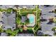 Aerial view of a community featuring a pool, lush landscaping, and well-maintained buildings at 5001 Sharon Rd # H, Charlotte, NC 28210