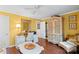 Bedroom with elegant armoire, desk, and decor, offering a stylish and functional living space at 5001 Sharon Rd # H, Charlotte, NC 28210