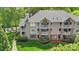 Beautiful condominium complex featuring multiple balconies, and well-maintained landscaping at 5001 Sharon Rd # H, Charlotte, NC 28210