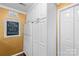 Well-lit kitchen featuring modern appliances, ample storage, and a chalkboard for notes at 5001 Sharon Rd # H, Charlotte, NC 28210