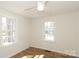Bedroom filled with sunlight features two windows and wood flooring at 517 Roberts Ave, York, SC 29745