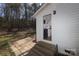 Home's exterior featuring steps and a patio leading to the back door at 517 Roberts Ave, York, SC 29745