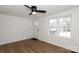 Airy room featuring laminate flooring, a ceiling fan, and great natural light at 517 Roberts Ave, York, SC 29745