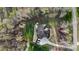 Aerial view of home showcasing lush landscaping, mature trees and spacious grounds at 518 May Green Dr, Clover, SC 29710