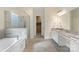 Bathroom with double vanity, separate shower, soaking tub and tile floors at 518 May Green Dr, Clover, SC 29710
