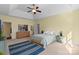 Bright bedroom with ensuite bathroom and walk in closet access at 518 May Green Dr, Clover, SC 29710