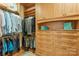 Walk-in closet featuring built-in shelving, drawers, and ample storage space at 518 May Green Dr, Clover, SC 29710