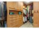 Spacious walk-in closet with custom shelving, drawers, and hanging rods for optimal organization at 518 May Green Dr, Clover, SC 29710