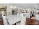 Open floor plan dining area with views of the kitchen and a modern chandelier at 518 May Green Dr, Clover, SC 29710